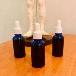 Aceite terapéutico de hierbas medicinales